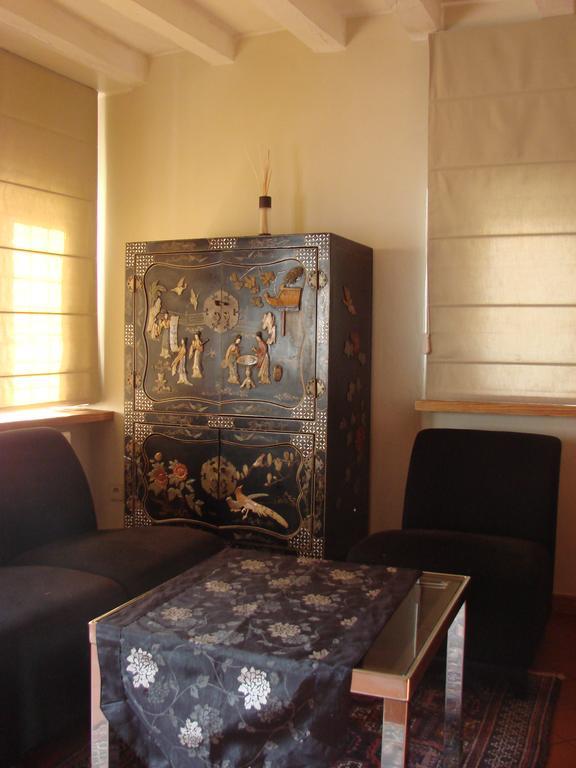 Aparthotel De Beek Anno 1410 Sint-Truiden Room photo